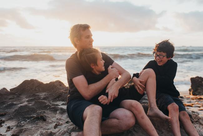 Family-Photographer-Perth-Burns-Beach-29-of-57 Father playing with boys at Burns Beach with Perth Family Photographer
