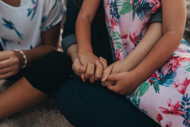 Family-Photographer-Perth-Burns-Beach-40-of-57 Mother and daughter holding hands at Burns Beach with Perth Family Photographer