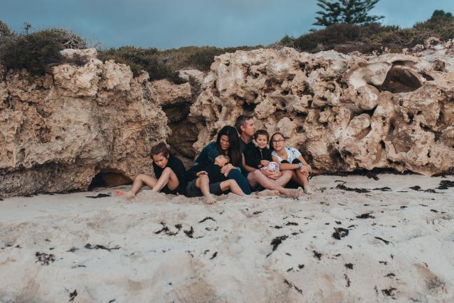 Family-Photographer-Perth-Burns-Beach-48-of-57 Family of 6 sitting on sand at Burns Beach with Perth Family Photographer