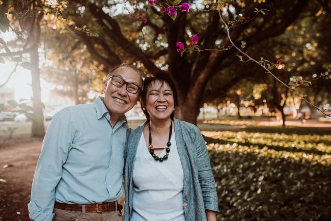 Family-Photographer-Perth-Hyde-Park-19-of-54 Couple smile at the camera during Perth extended family session at Hyde Park with Perth family photographer