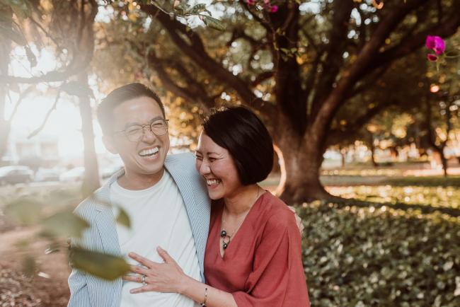 Family-Photographer-Perth-Hyde-Park-21-of-54 Couple laugh during Perth extended family session at Hyde Park with Perth family photographer