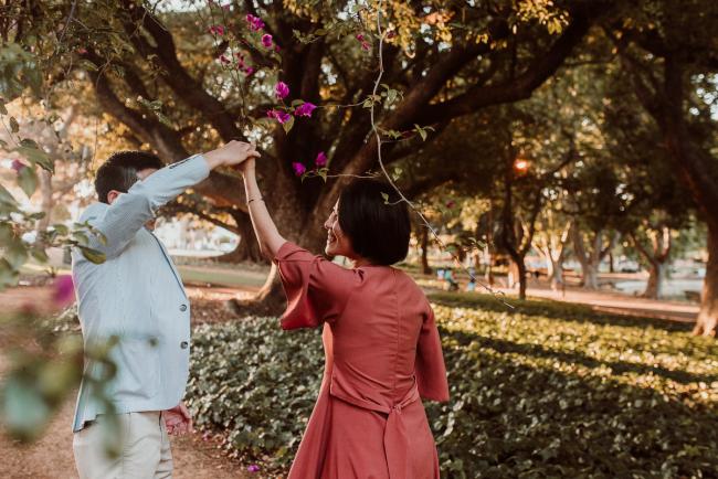 Family-Photographer-Perth-Hyde-Park-22-of-54 Husband spins wife around during Perth extended family session at Hyde Park with Perth family photographer