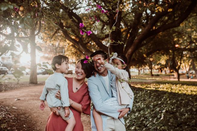 Family-Photographer-Perth-Hyde-Park-30-of-54 Parents holding son and daughter during Perth extended family session at Hyde Park with Perth family photographer