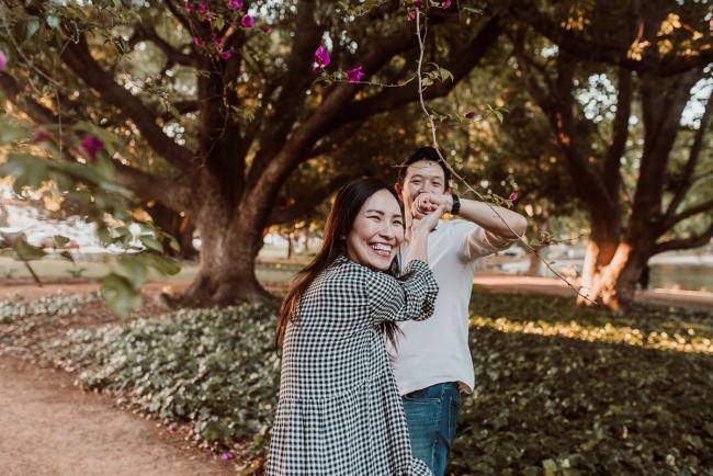 Couple dancing during Perth extended family session at Hyde Park with Perth family photographer