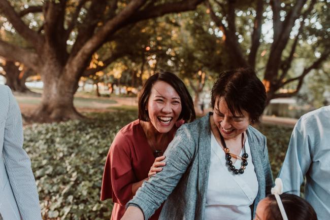 Family-Photographer-Perth-Hyde-Park-41-of-54 Women laughing during Perth extended family session at Hyde Park with Perth family photographer