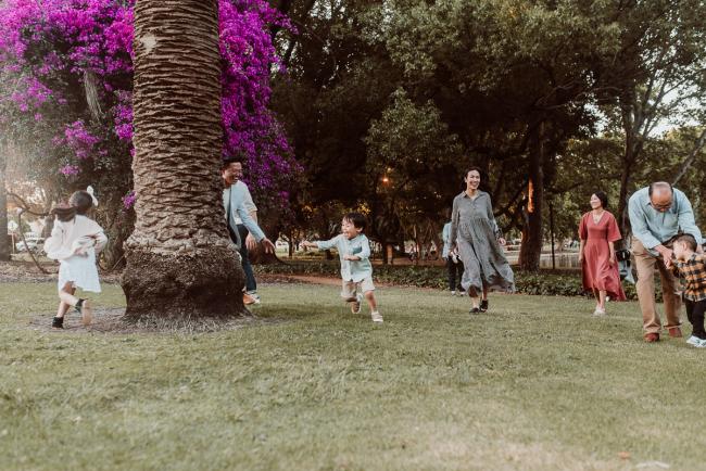 Family-Photographer-Perth-Hyde-Park-44-of-54 Family chasing each other around a tree during Perth extended family session at Hyde Park with Perth family photographer