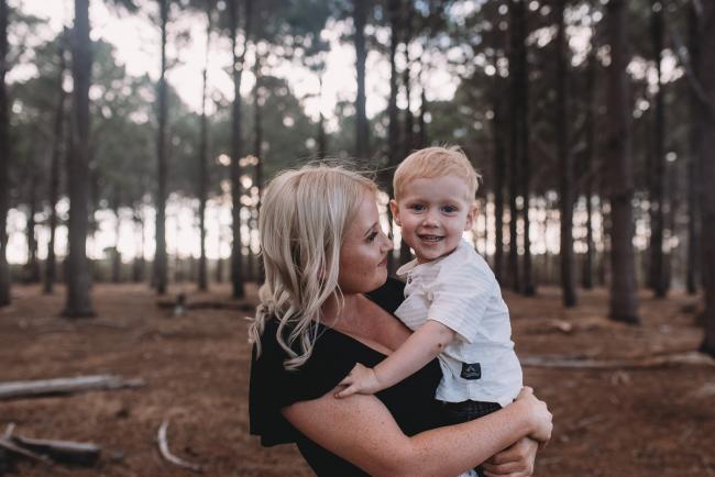 Family-Photographer-Perth-The-Pines-1-of-29 mother holding son during Perth family photography session at The Pines Wanneroo