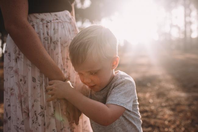 Family-Photographer-Perth-The-Pines-11-of-29 Son holding mother's hand during Perth family photography session at The Pines Wanneroo