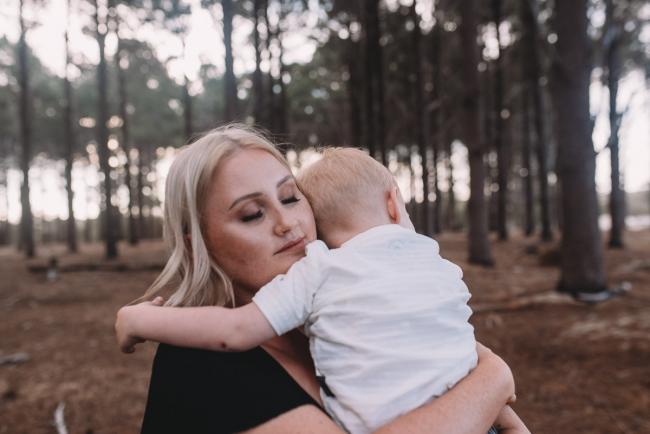 Family-Photographer-Perth-The-Pines-2-of-29 Mother and son hugging during Perth family photography session at The Pines Wanneroo