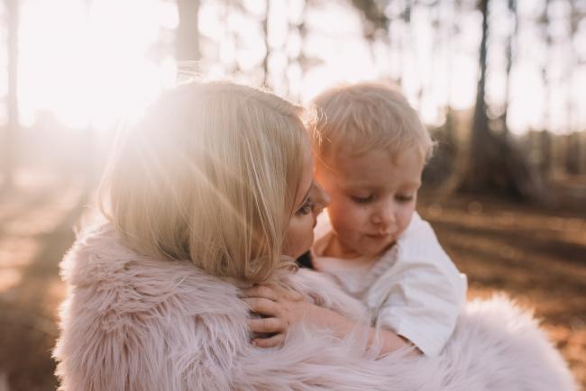 Family-Photographer-Perth-The-Pines-22-of-29 mother holding son during Perth family photography session at The Pines Wanneroo