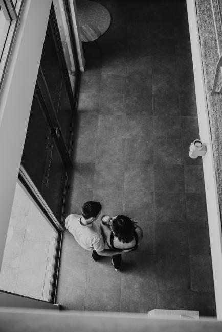 Newborn-Lifestyle-Photographer-Perth-47-of-50 Black and white top down image of parents walking with newborn baby during Perth lifestyle newborn photography session