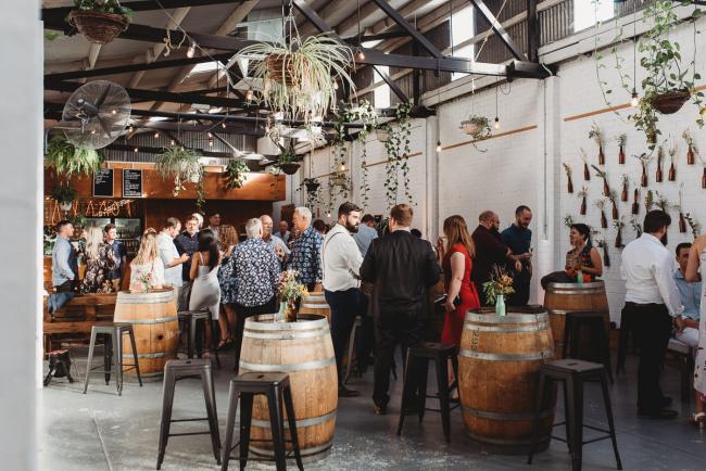 Room full of people during a party at Cleaver St Event Space with Perth events photographer