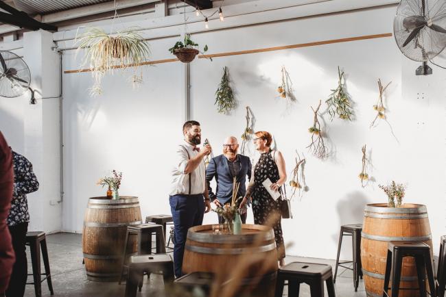 People talking during a party at Cleaver St Event Space with Perth events photographer