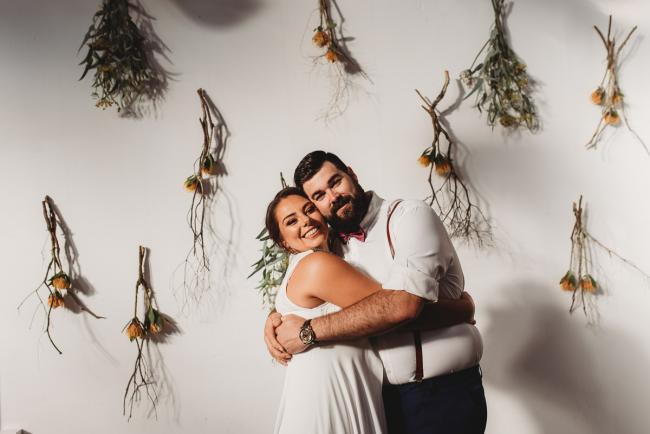 Couple hugging during a party at Cleaver St Event Space with Perth events photographer