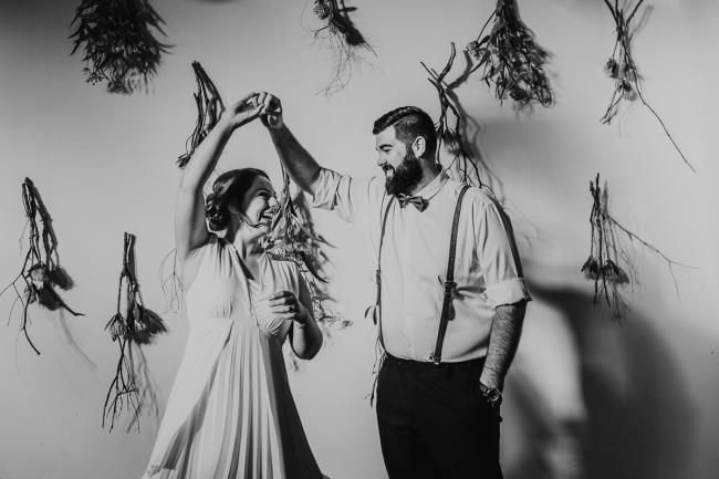 Black and white image of couple dancing during a party at Cleaver St Event Space with Perth events photographer