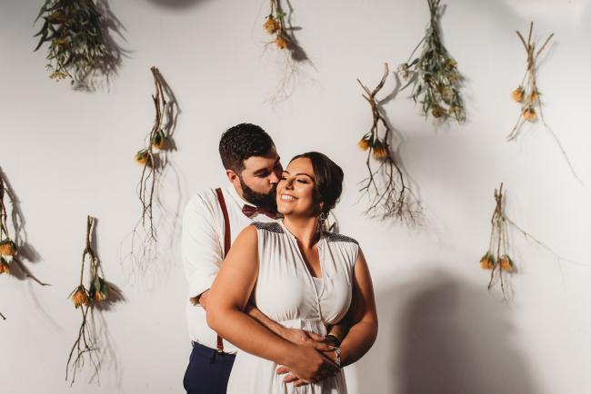 Couple hugging during a party at Cleaver St Event Space with Perth events photographer