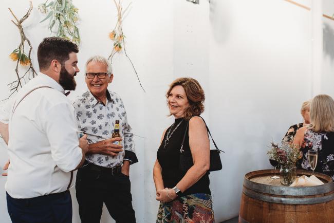 People talking during a party at Cleaver St Event Space with Perth events photographer