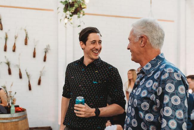 Men laughing during a party at Cleaver St Event Space with Perth events photographer
