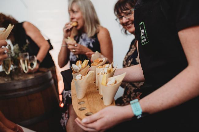 Food being carried around during a party at Cleaver St Event Space with Perth events photographer