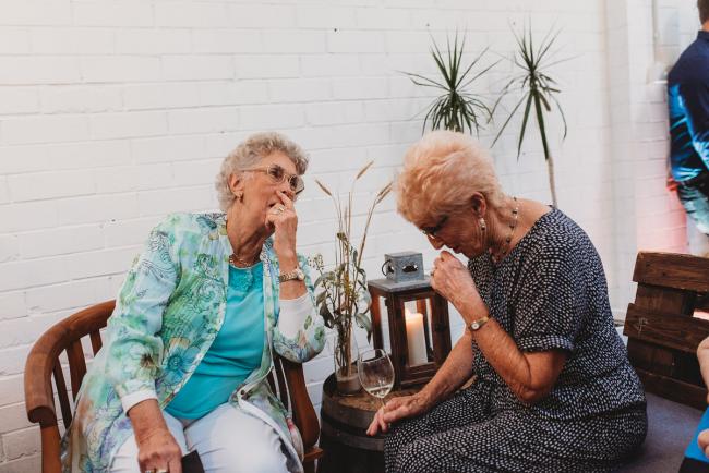 Old women laughing during a party at Cleaver St Event Space with Perth events photographer
