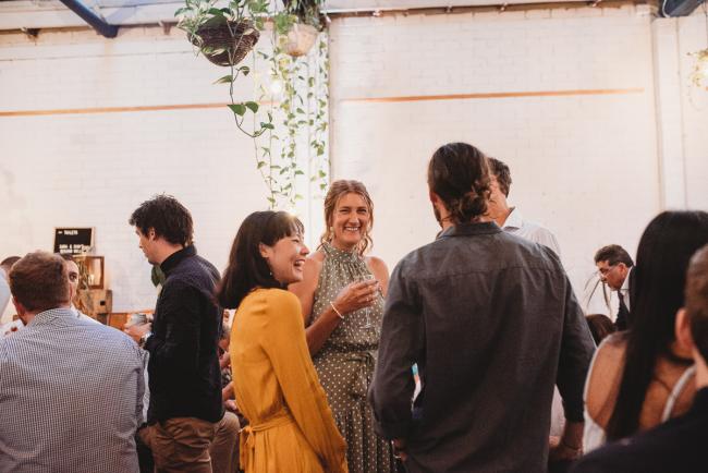 People talking during a party at Cleaver St Event Space with Perth events photographer
