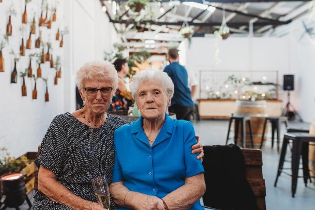 Women looking at the camera during a party at Cleaver St Event Space with Perth events photographer