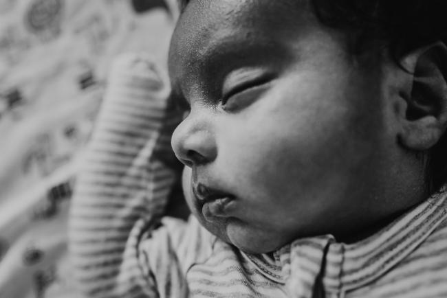 black and white close up of newborn baby cheeks with Perth newborn photographer