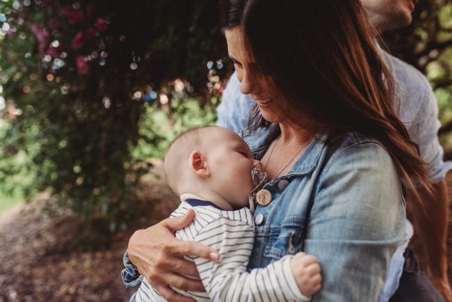 Baby sleeping on mother during extended family session at Hyde Park with Perth family photographer Alana Prosper Photography