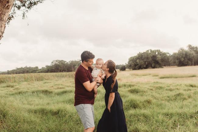 Parents kissing baby during family session at Perry's Paddock with Perth family photographer Alana Prosper Photography