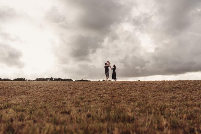 silhouette image of parents and baby with Perth Family Photographer Alana Prosper Photography at Perry's Paddock