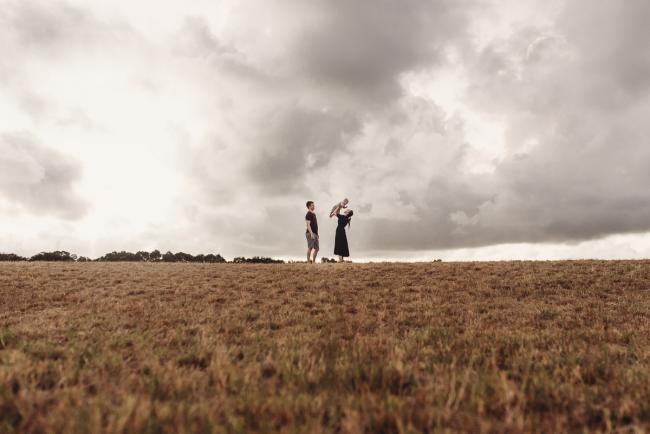 silhouette image of parents and baby with Perth Family Photographer Alana Prosper Photography at Perry's Paddock