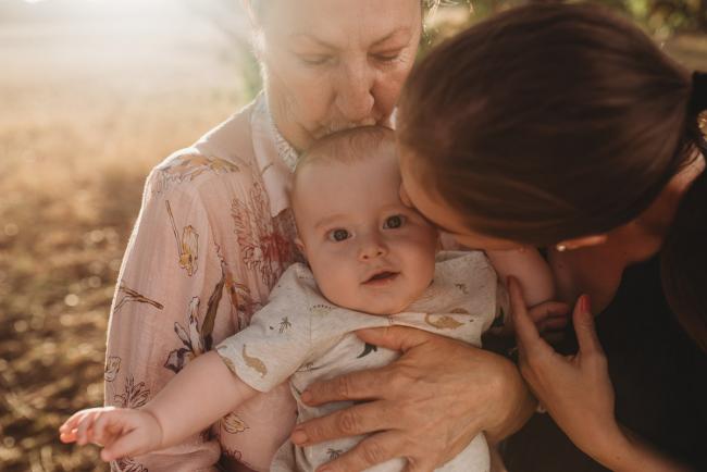 Mother and grandmother kissing baby with Perth Family Photographer Alana Prosper Photography at Perry's Paddock