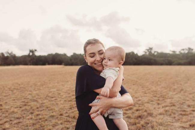 Mother cuddling baby with Perth Family Photographer Alana Prosper Photography at Perry's Paddock