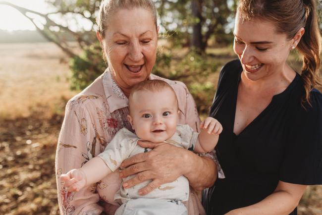 Mother and grandmother holding baby with Perth Family Photographer Alana Prosper Photography at Perry's Paddock