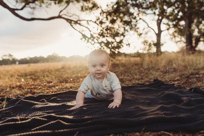 Baby on tummy on blanket with Perth Family Photographer Alana Prosper Photography at Perry's Paddock