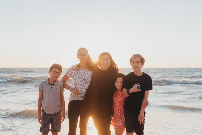 mother and four kids with Perth family photographer Alana Prosper Photography at Burns Beach