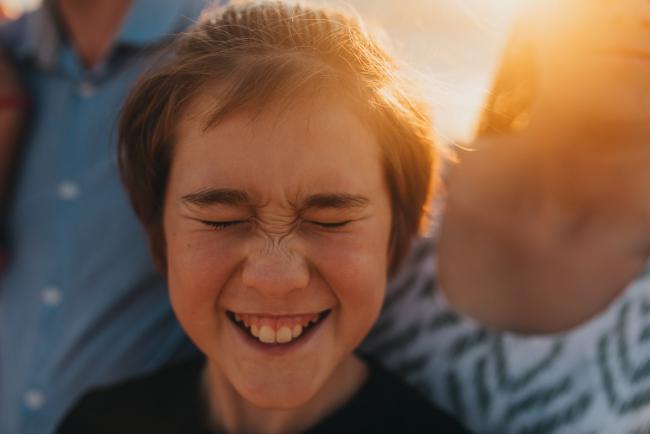 close up of boy with Perth family photographer Alana Prosper Photography at Burns Beach