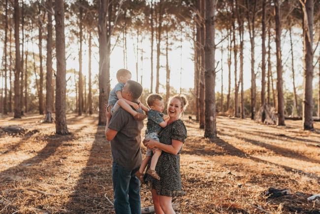 Family of four during Perth family photography session at The Pines Perth with Alana Prosper Photography