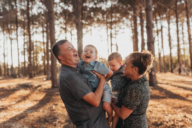 Family of four during Perth family photography session at The Pines Perth with Alana Prosper Photography