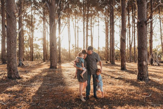 Family of four during Perth family photography session at The Pines Perth with Alana Prosper Photography
