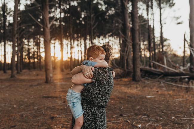 mother and son hugging during Perth family photography session at The Pines Perth with Alana Prosper Photography