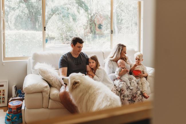 Perth-Newborn-Photographer-Alana-Prosper-Photography-29-of-31 family on couch with dog with Perth lifestyle newborn photographer Alana Prosper Photography