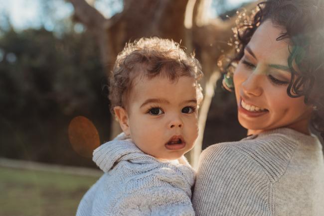 little boy in mothers arms with Perth family photographer Alana Prosper Photography at Hyde Park