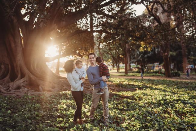 family of four under tree with Perth family photographer Alana Prosper Photography at Hyde Park