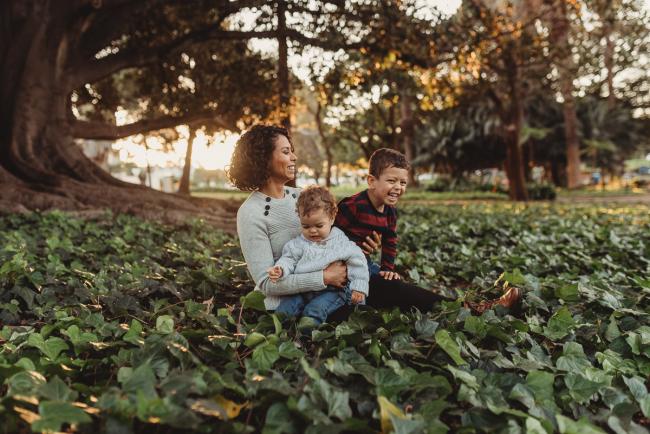mother and sons in grass with Perth family photographer Alana Prosper Photography at Hyde Park