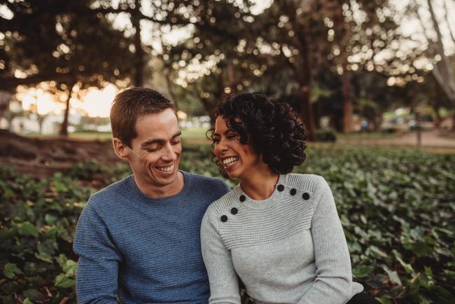 mother and father laughing with Perth family photographer Alana Prosper Photography at Hyde Park