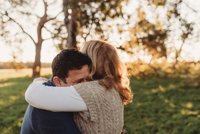 couple hugging with Perth family photographer Alana Prosper Photography at Perry's Paddock